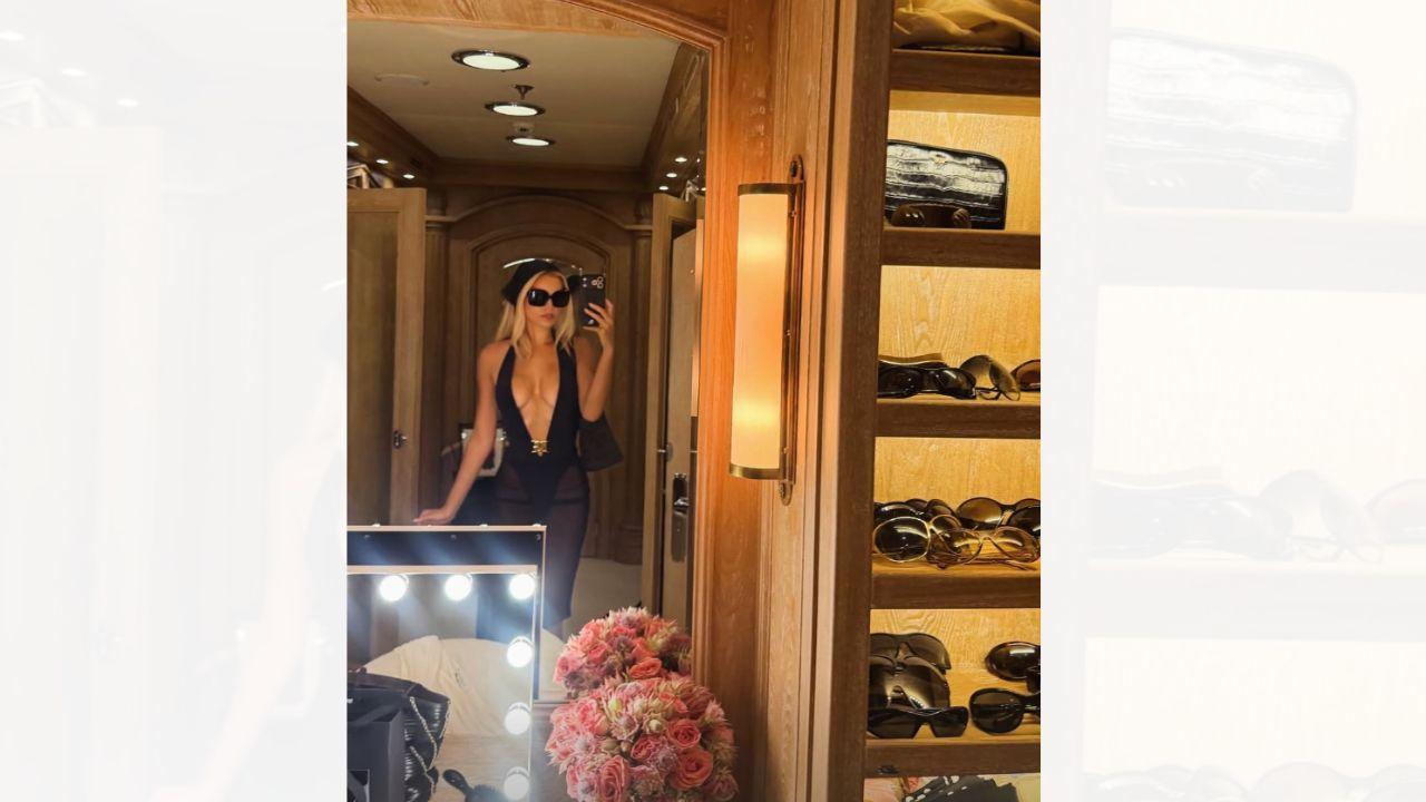 Image of Brooks Nader wore a low-cut top that showed off her cleavage. 
