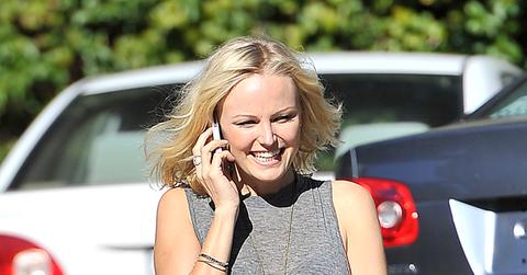Pregnant Malin Akerman smiles as she rubs her baby bump in West Hollywood
