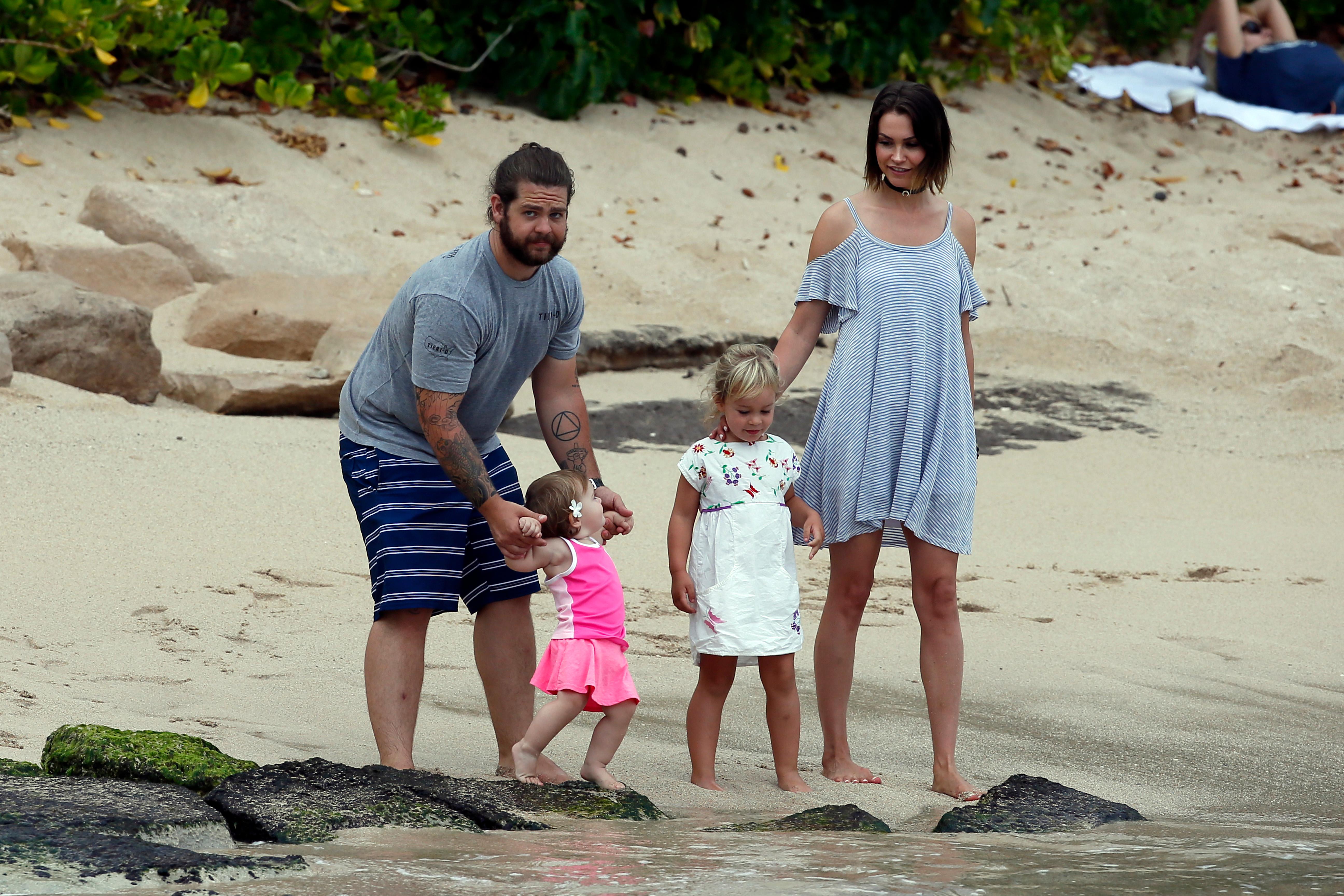 EXCLUSIVE: jack osbourne takes to the beach in Hawaii with his wife Lisa and children Pearl and Andy Rose