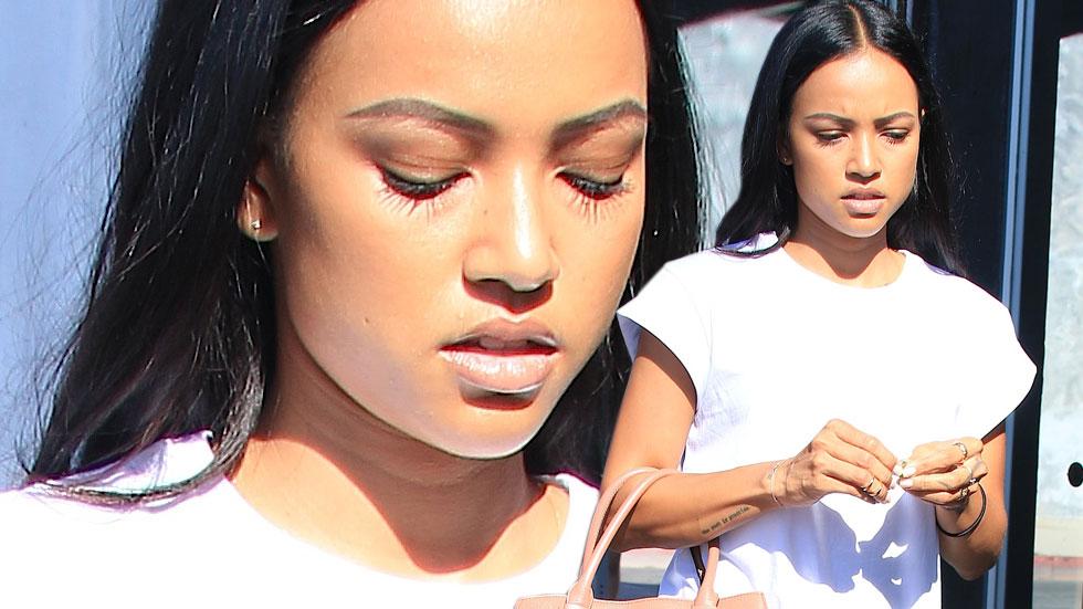 KARRUECHE TRAN LOOKS ANNOYED VISITING CHRISTINA MILIAN CLOTHING STORE