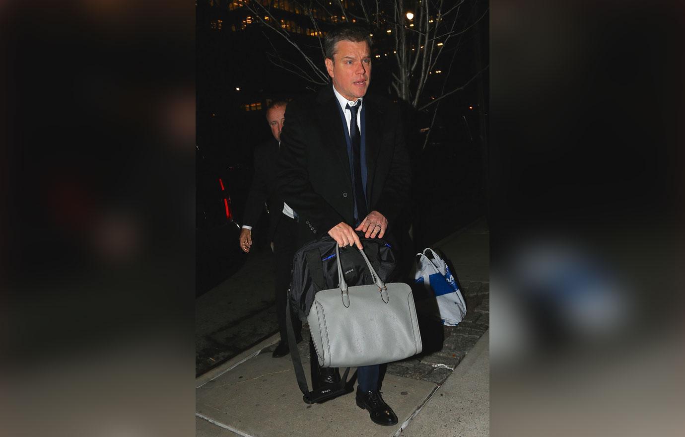 Matt damon carries wife purse