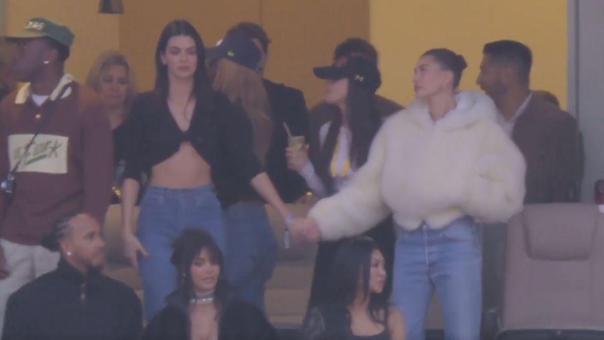 image of Hailey Bieber held hands with Kendall Jenner as they swayed during Bad Bunny’s Super Bowl Halftime Show.