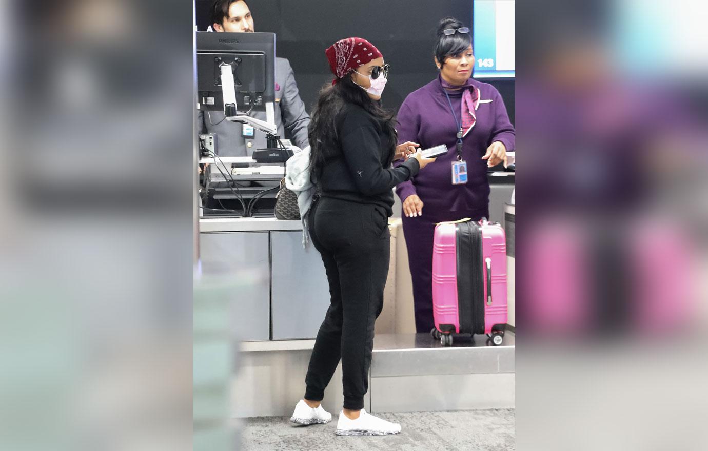 Angela Simmons Wears Face Mask At Airport Amid Coronavirus Outbreak