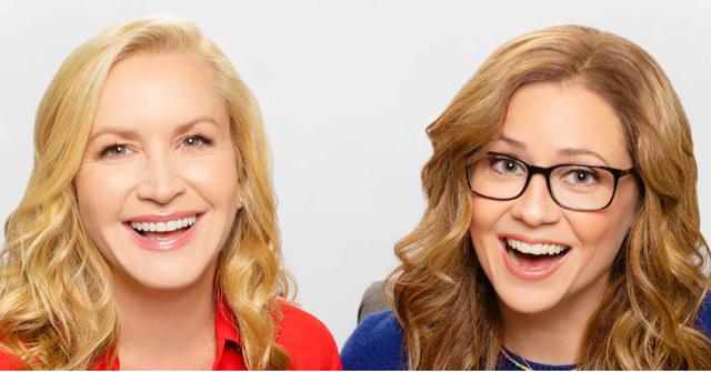 Angela Kinsey wore a collared red blouse while podcast co-host Jenna Fischer sported a blue sweater with a gold necklace.
