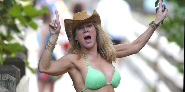 Ramona Singer looks very happy dancing on the boardwalk in Miami Beach