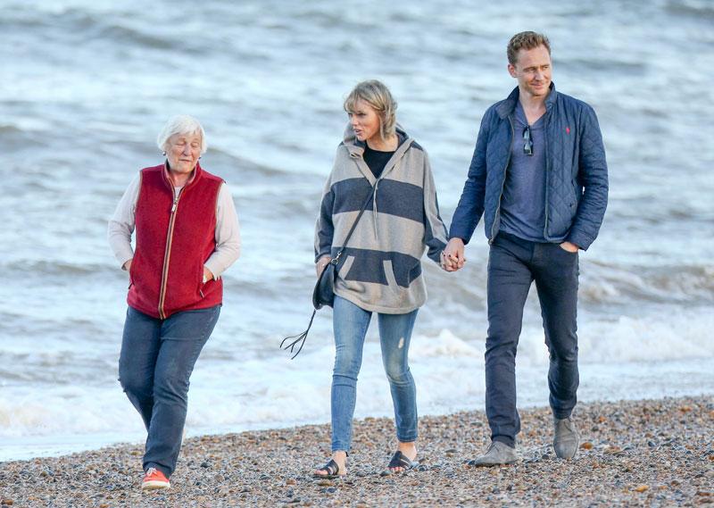 Taylor swift tom hiddleston hold hands cuddle beach date uk photos 06