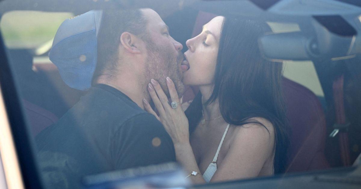 image of Stodden and Jared Safier showed PDA during a beach outing.