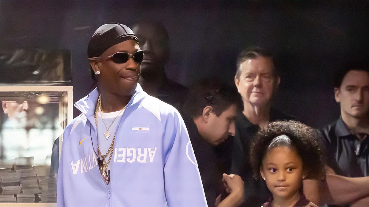Image of Travis Scott brought his daughter on stage during a performance one day after the alleged incident.