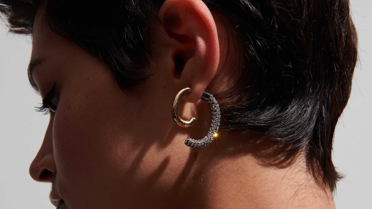 Photo of a woman wearing the Gold Pave Luna.