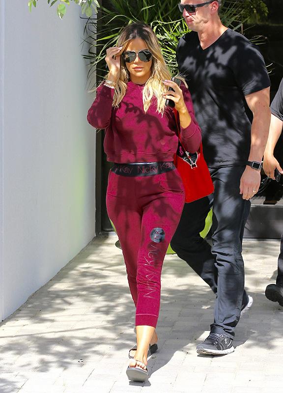 Shy Khloe Kardashian Stops By A Studio