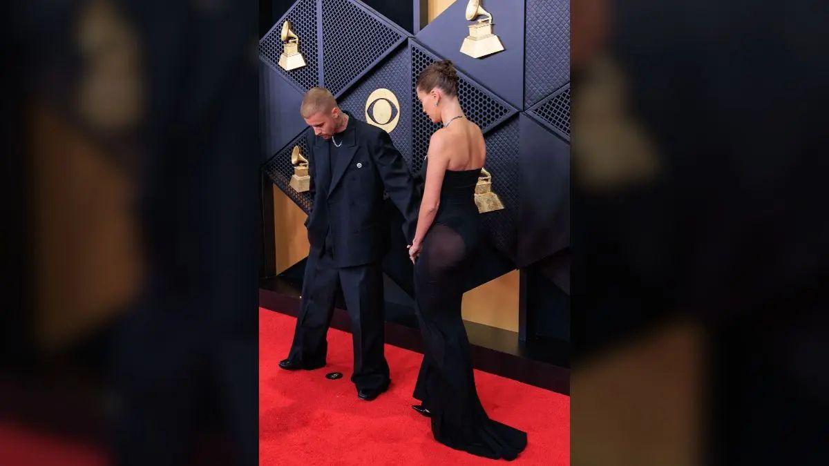 Photo of The singer was criticized for not helping his wife adjust her dress on the 2026 Grammys red carpet.
