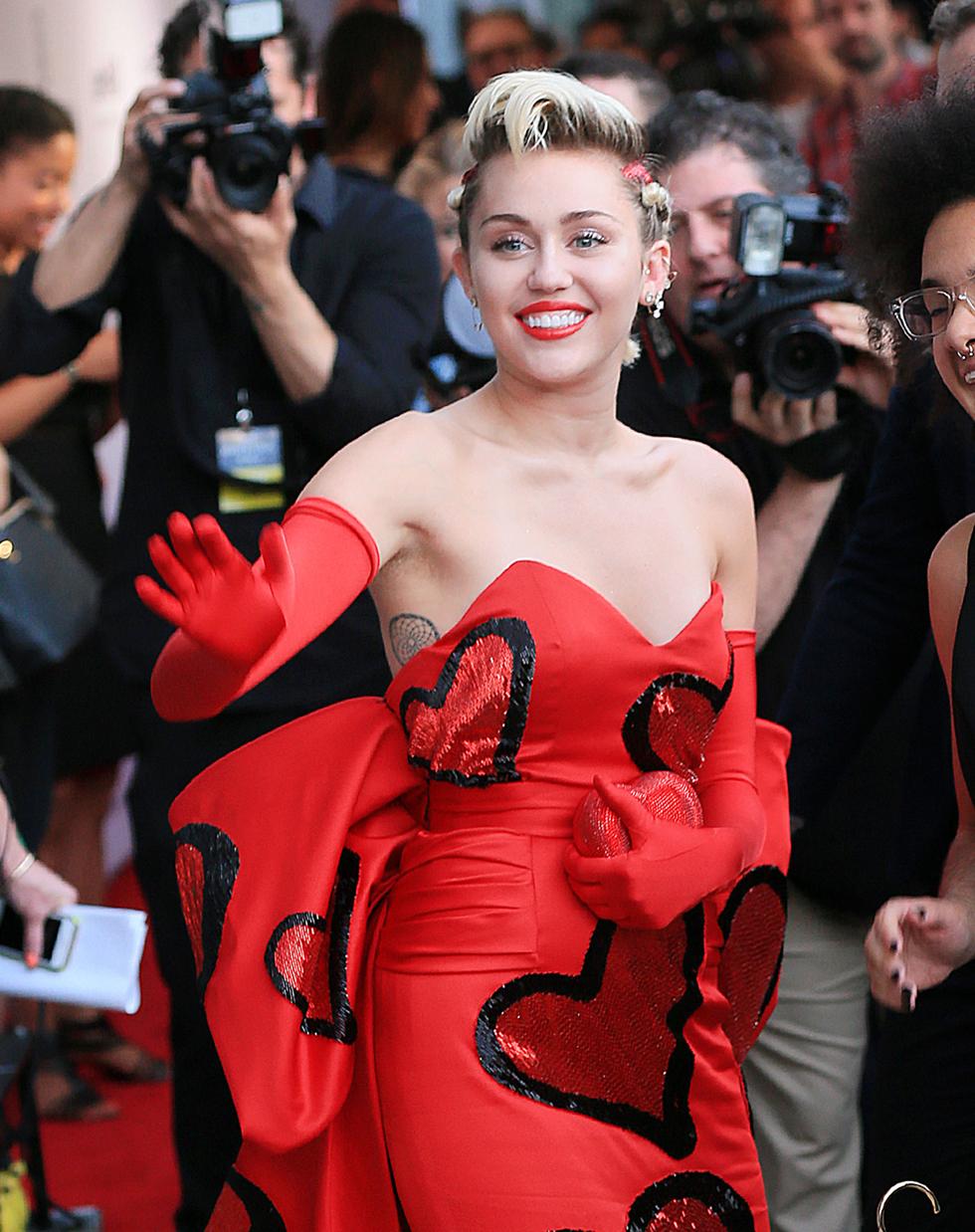 Miley Cyrus arrives at the amfAR Gala at Spring Studios in NYC