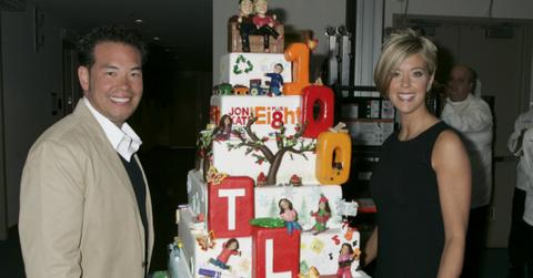 The stars of Jon and Kate Plus 8 pose with a cake.