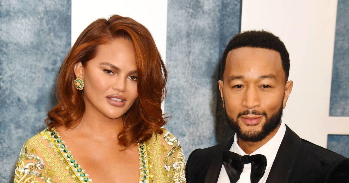 Watch the moment Chrissy Teigen's ENTIRE boob pops out as husband