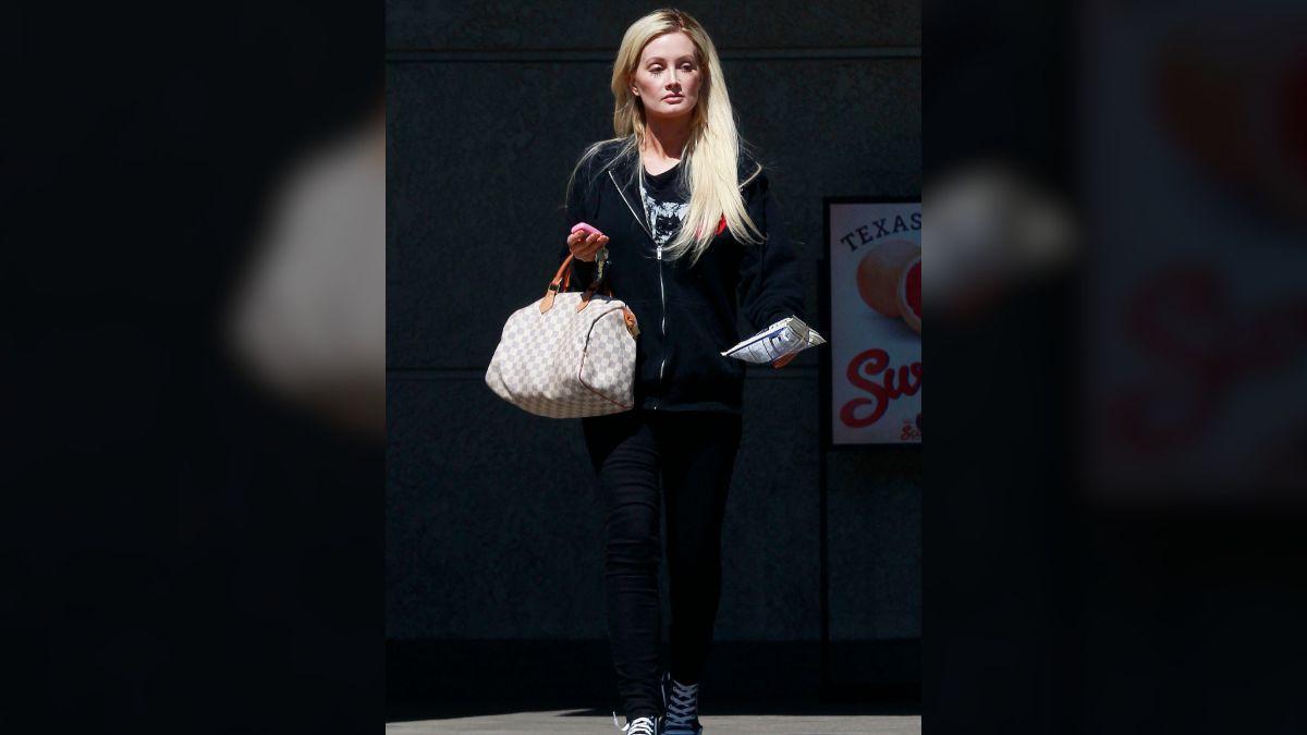 Photo of Holly Madison confirmed her relationship to Steve Dimopoulos in March.