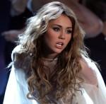 2010__12__Miley_Cyrus_Dec16newsnea 150×147.jpg