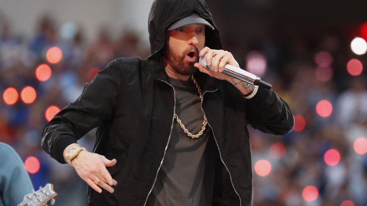 Image of Eminem shared a touching note Dolly Parton shared with him when he was inducted into the Rock & Roll Hall of Fame.