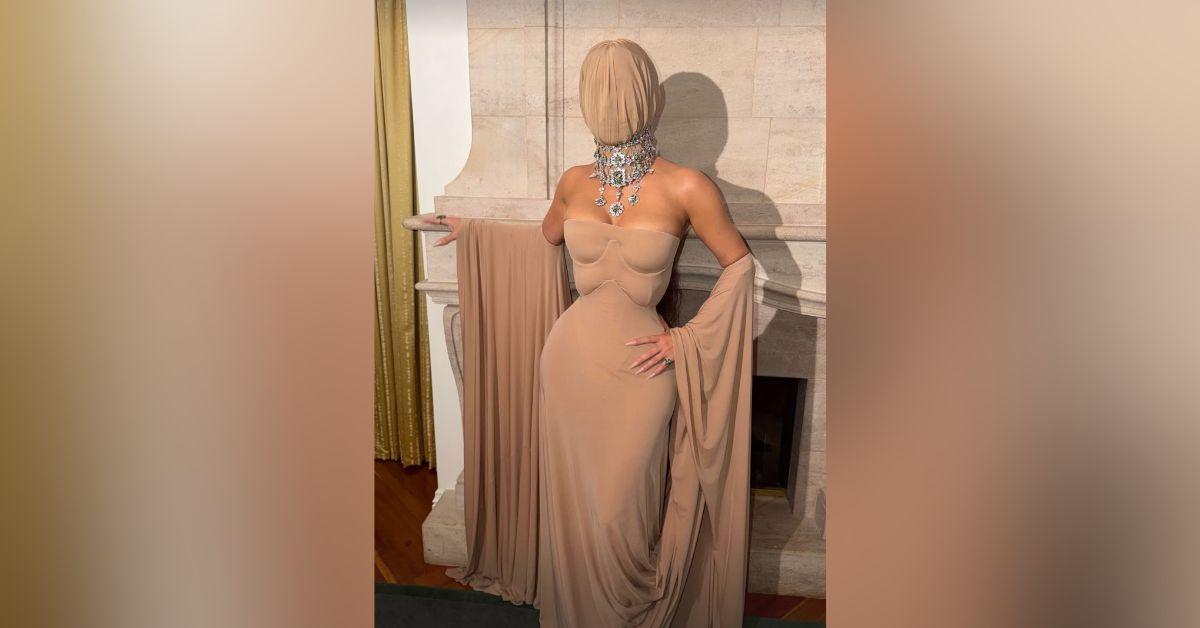 Image of Kim Kardashian wore a monochromatic, beige ensemble.