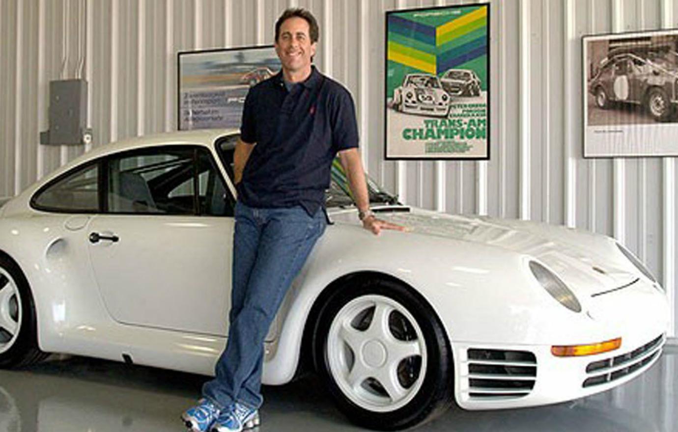 Jerry Seinfeld, who wore jeans and a navy blue polo shirt, stood next to his prized Porsche 959.