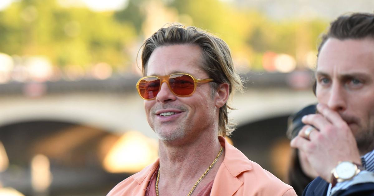 Brad Pitt Shows Off Orange Suit In Paris After Visiting Kids: Photos