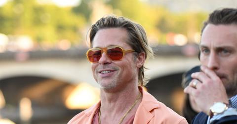 brad pitt orange suit sighting