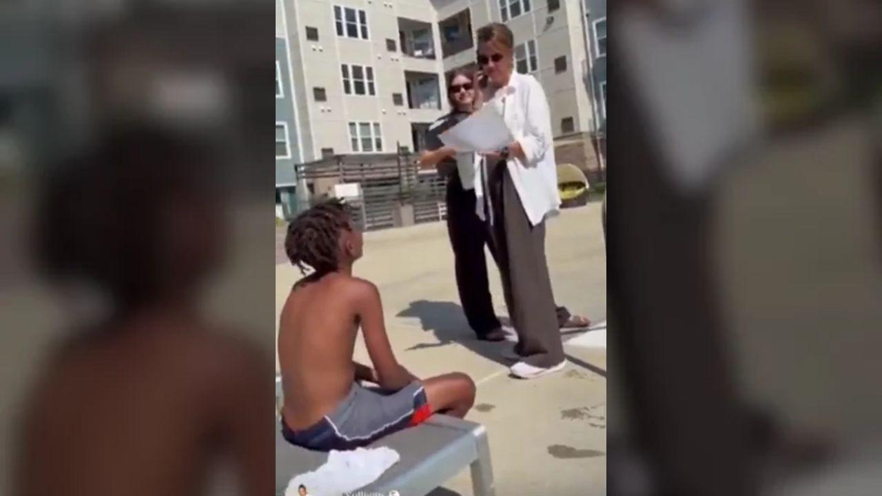 Image of the Black man noticed the smile on the face of the woman who was calling the police.