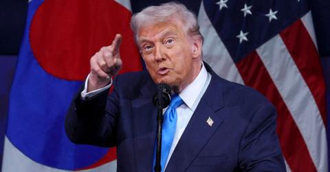 donald trump grips handrail avoids falling air force one south korea