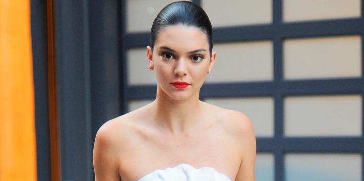 Kendall Jenner looks striking in white as she heads to the Zac Posen fashion show in NYC