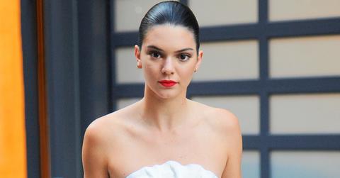 Kendall Jenner looks striking in white as she heads to the Zac Posen fashion show in NYC
