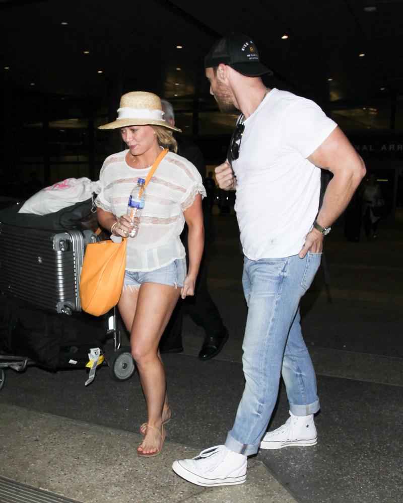 Hilary Duff departs from the airport with her new boyfriend Jason