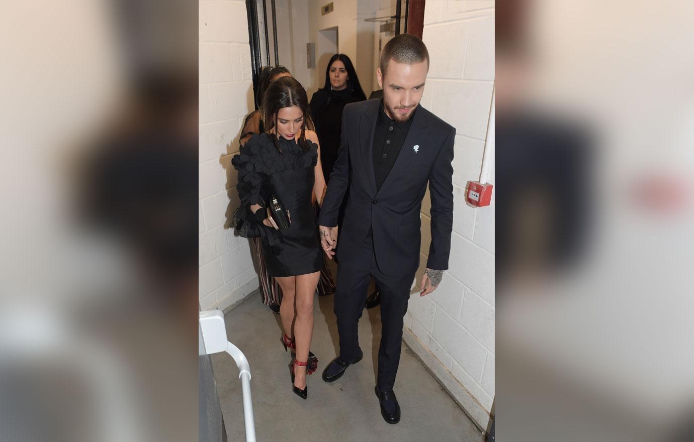 Liam Payne and Cheryl Cole look downbeat following Brit Awards