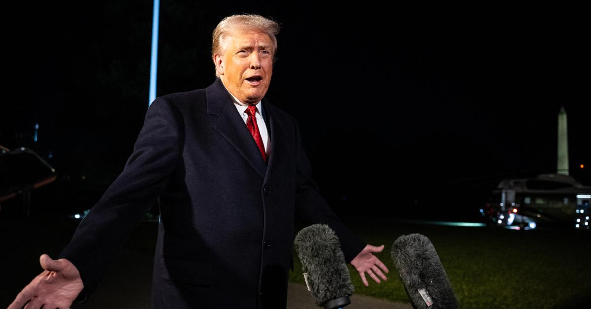 Image of Donald Trump spoke to reporters before departing to Malaysia.