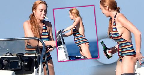 lindsay lohan pregnant baby bump smoking drinking