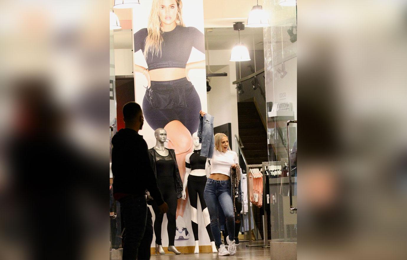 Fans slam Tammy Hembrow's braless look as 'unclassy' as she flashes  underboob shopping