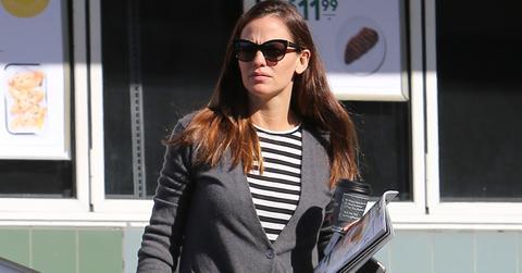 Jennifer Garner picks up a magazine while running errands
