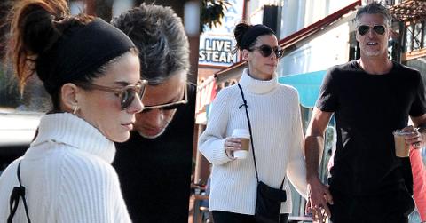 Sandra bullock brian randall hold hands coffee date