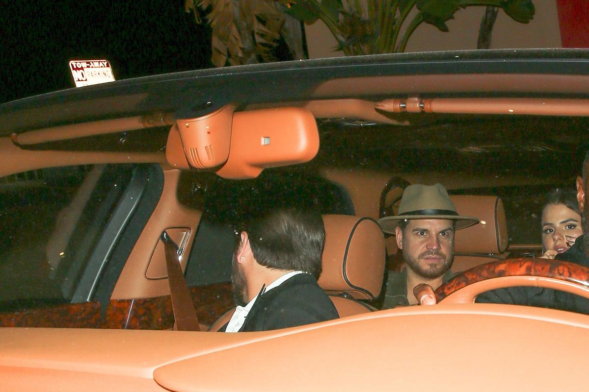 Scott Disick is camera shy at Rihanna&#8217;s Grammy Awards Party at 1 OAK