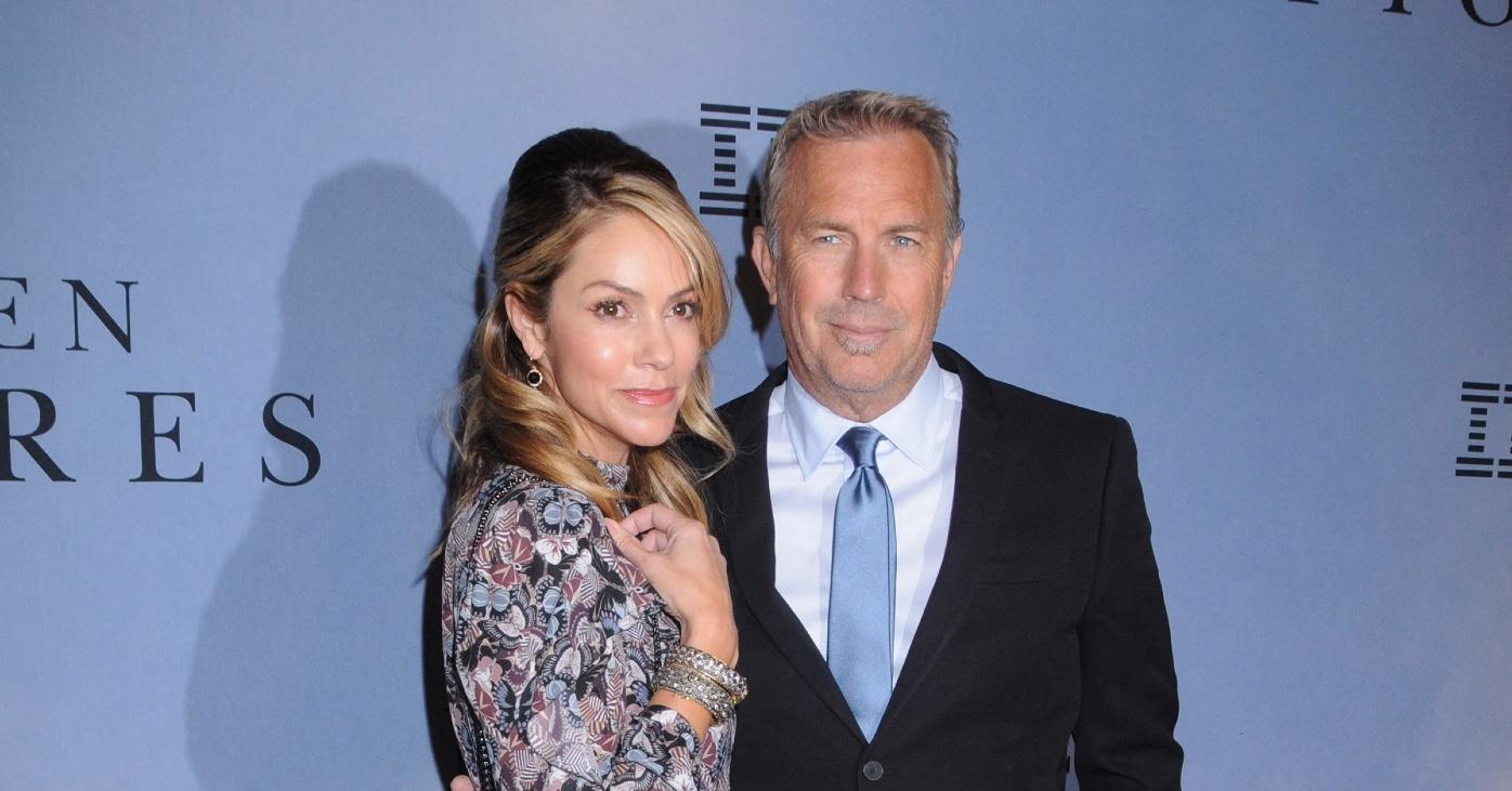 Kevin Costner's estranged wife wears Prada purse after begging