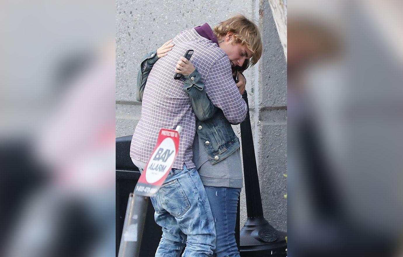 Birthday boy Justin Bieber gives his mother a warm embrace