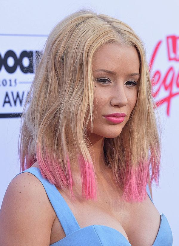 Iggy Azalea flashes her bum in see-through leggings - after denying she's  had implants to make it bigger