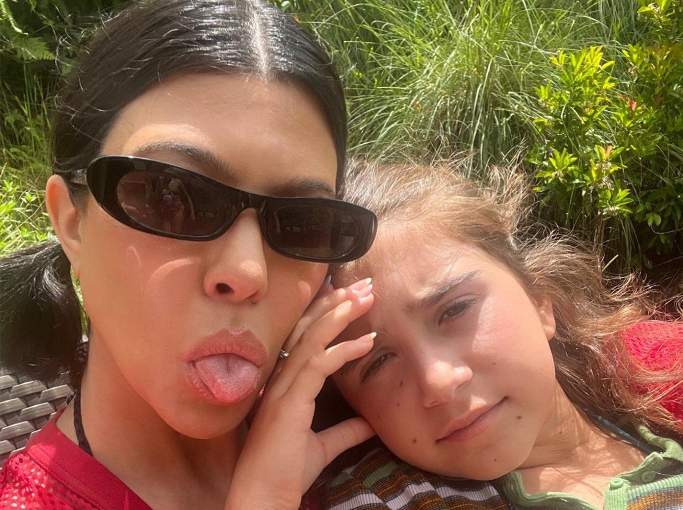 kourtney kardashian divides fans daughter penelope slept bed until