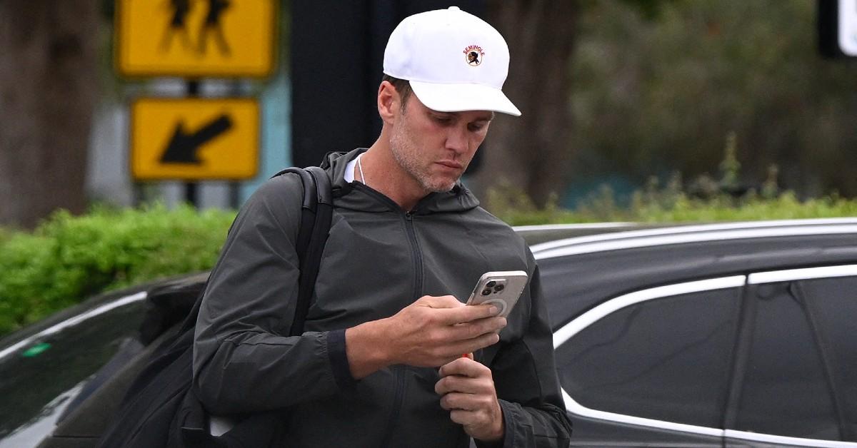 tom brady looks glum leaving gym