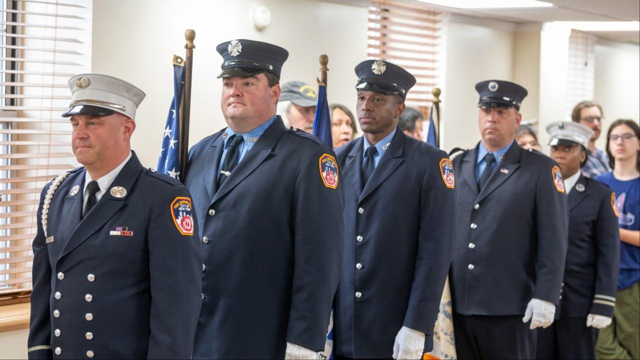 Uniformed men at an event.
