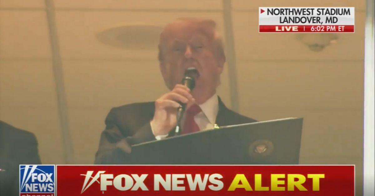 image of Donald Trump was booed at the Commanders game.