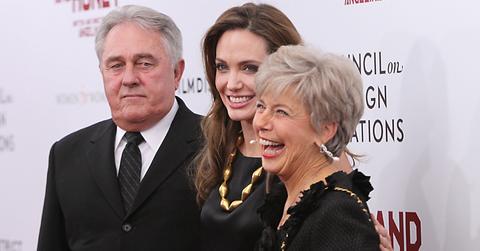 Angelina Jolie walks Brad Pitt’s parents down the red carpet at the Premiere of In the Land of Blood & Honey in NYC