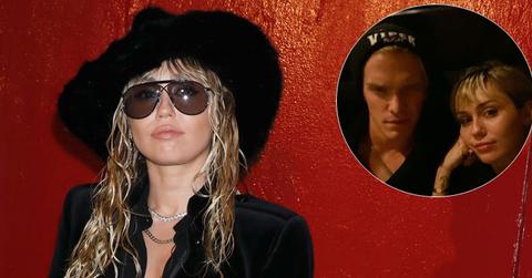 Miley Cyrus In Hat With Cody Simpson Inset