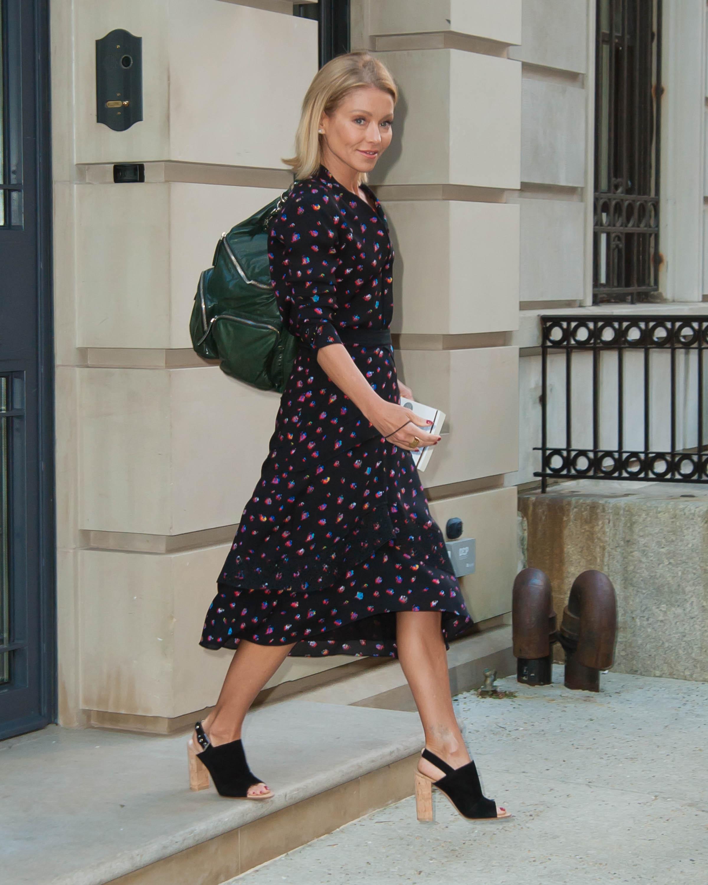 Kelly Ripa is all smiles as she heads out in New York City