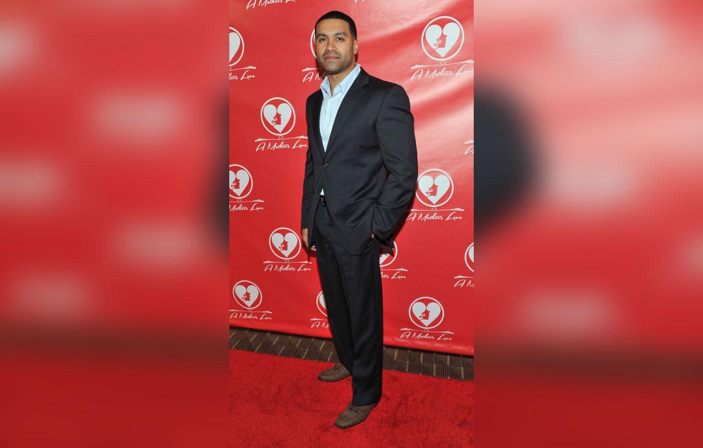 Apollo Nida Poses On A Red Carpet