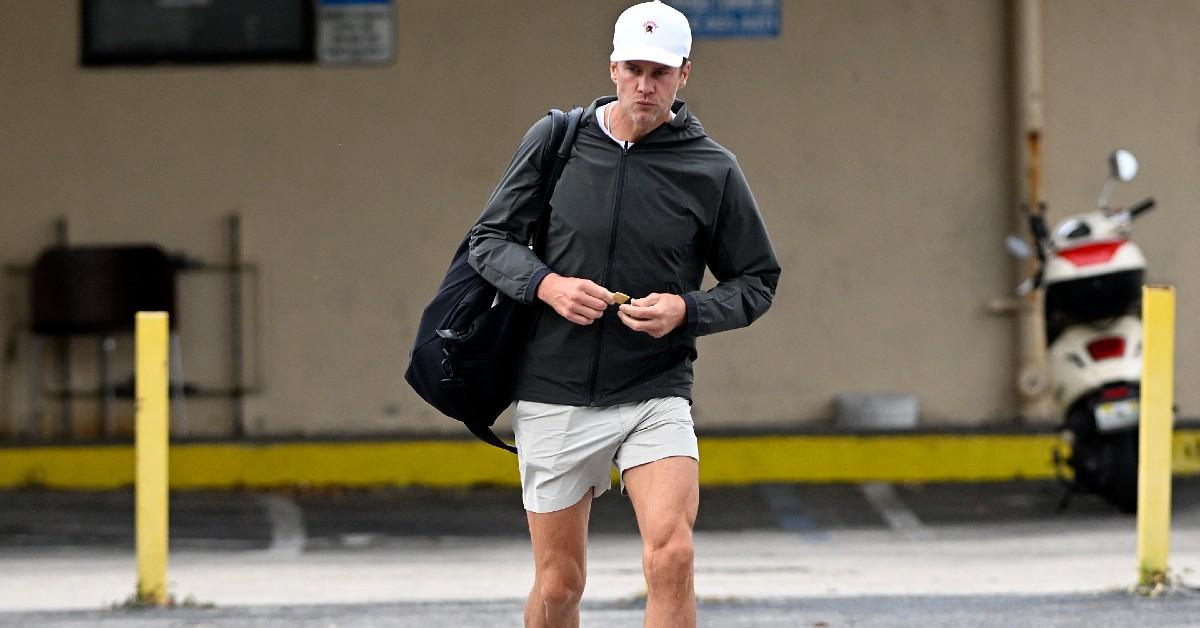 tom brady looks glum leaving gym