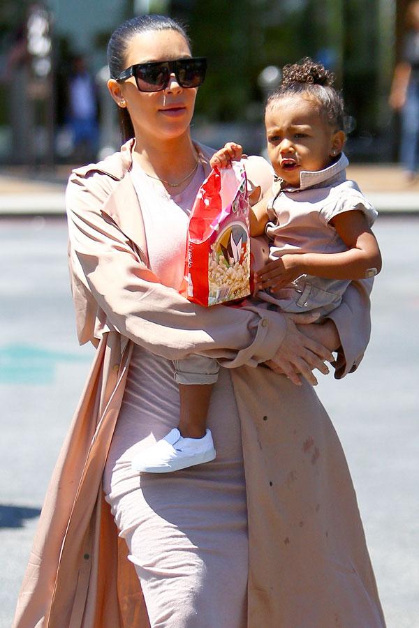 Kim kardashian hires personal trainer north west akm